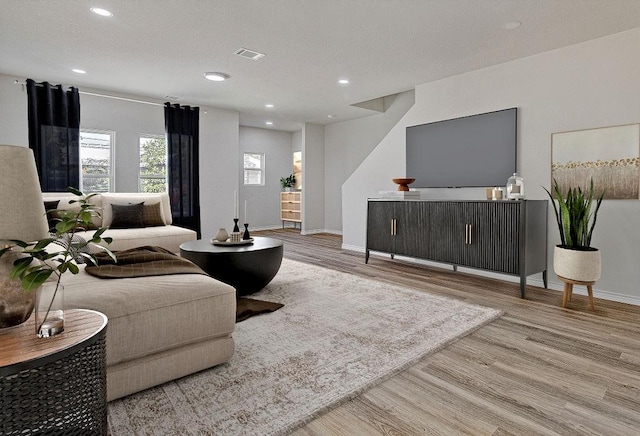 living room featuring light hardwood / wood-style flooring