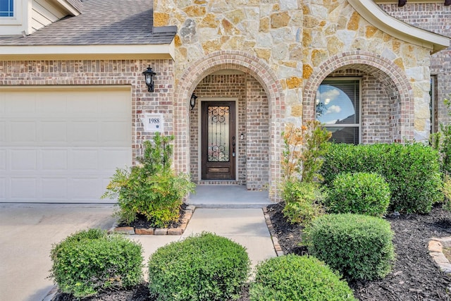 property entrance featuring a garage