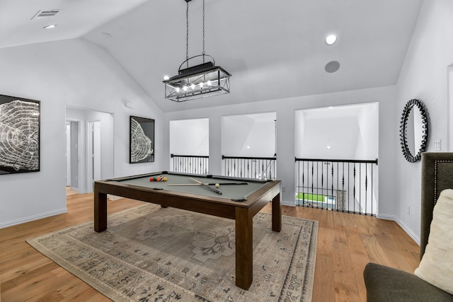 playroom with vaulted ceiling, pool table, and light hardwood / wood-style floors