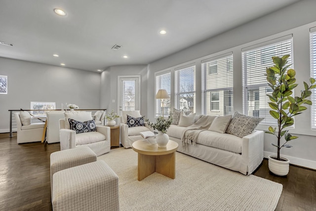 living room featuring dark hardwood / wood-style floors