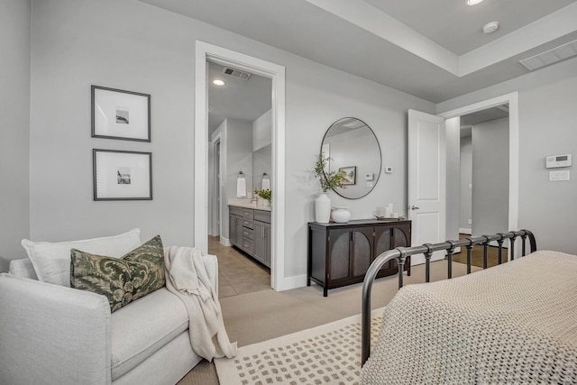 bedroom featuring ensuite bath