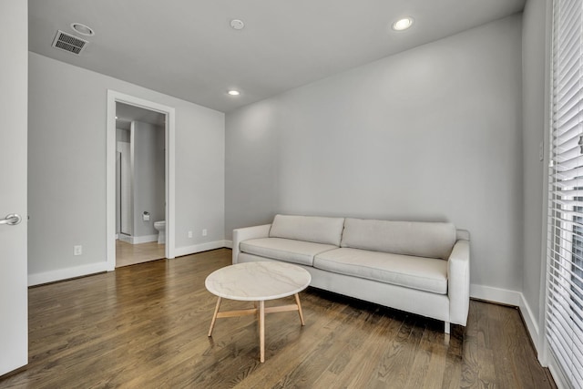 living room with dark wood-type flooring