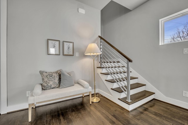 stairs with wood-type flooring