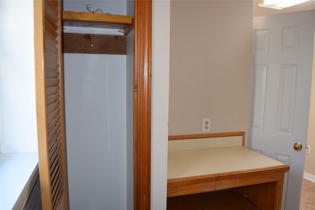 bathroom with tile patterned flooring