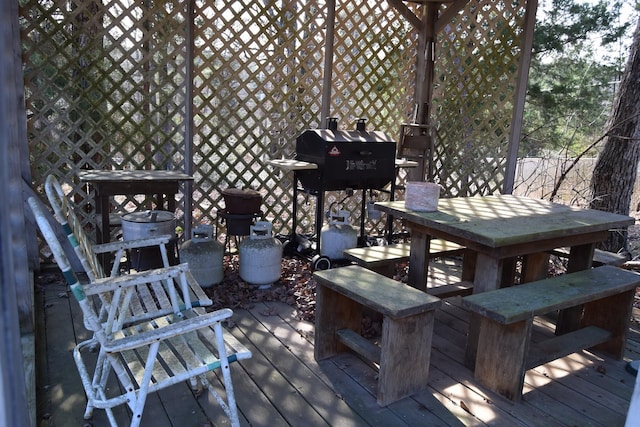 deck featuring a grill