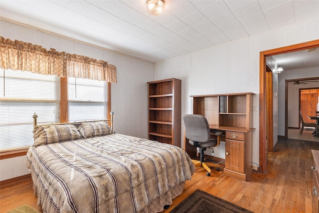 bedroom featuring hardwood / wood-style flooring