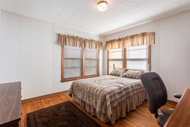 bedroom with light hardwood / wood-style floors