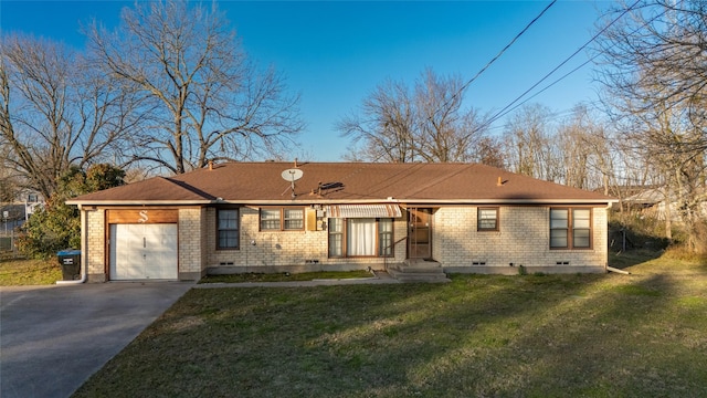 view of front facade with a front yard and a garage