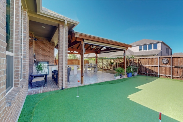 view of patio / terrace with ceiling fan