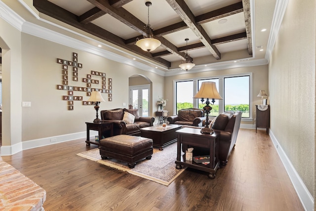 living room with beamed ceiling, french doors, ornamental molding, hardwood / wood-style flooring, and coffered ceiling