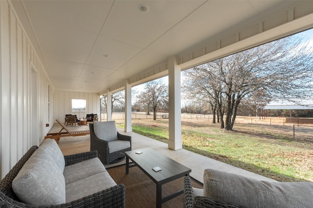 view of patio with a rural view and an outdoor living space