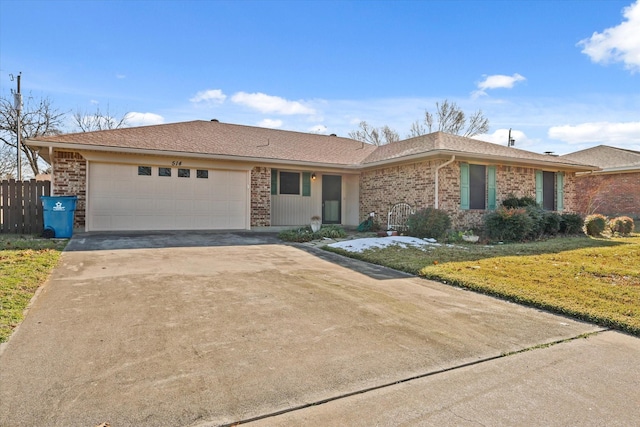 single story home featuring a front yard and a garage