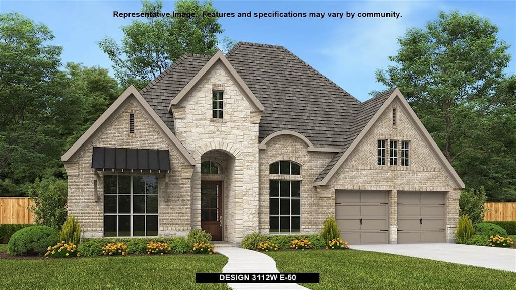 view of front facade featuring a front yard and a garage