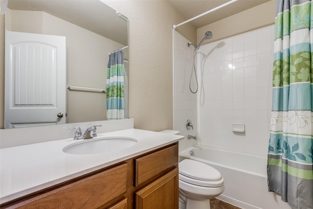 full bathroom featuring toilet, vanity, and shower / bath combination with curtain