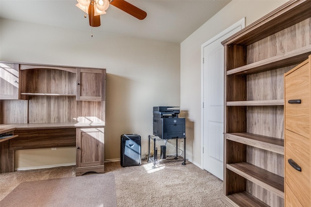 office area with ceiling fan and carpet