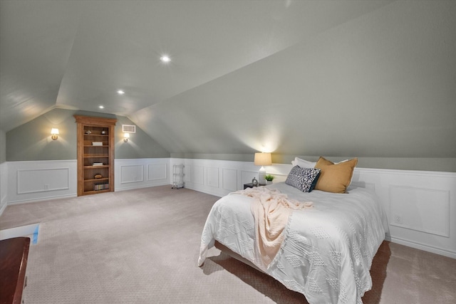 carpeted bedroom featuring vaulted ceiling