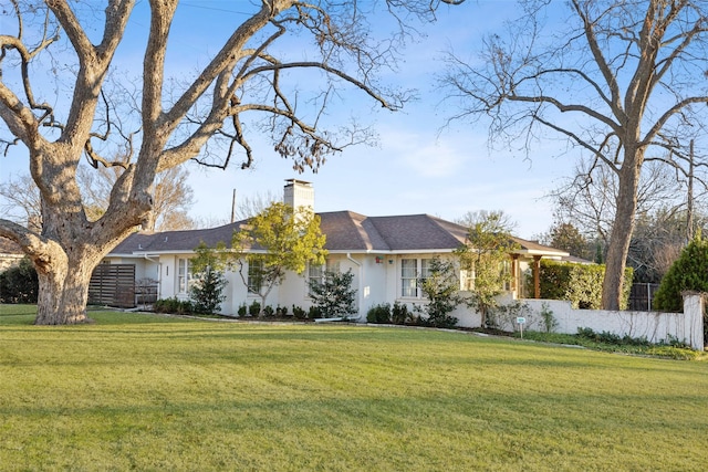 ranch-style house with a front yard