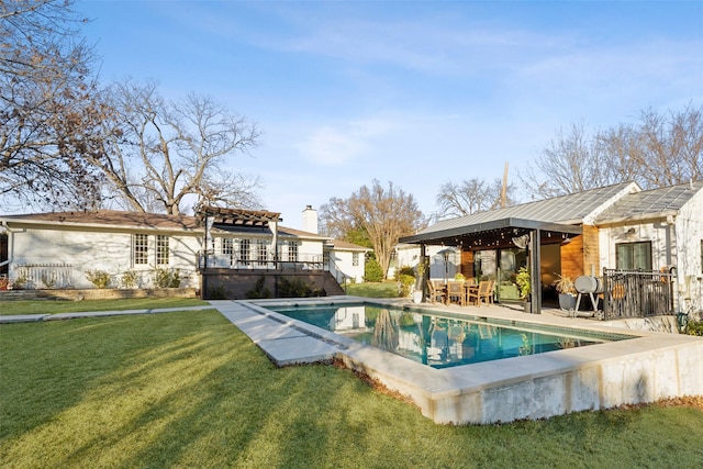 view of swimming pool with a pergola, a yard, and a patio