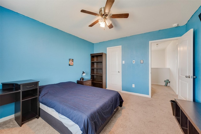 bedroom featuring ceiling fan and light colored carpet