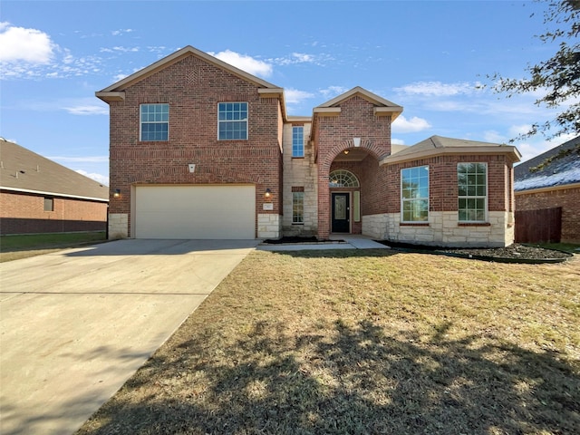 view of front of property with a front lawn and a garage