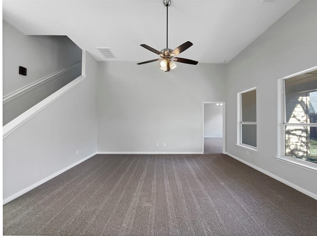 carpeted empty room with ceiling fan