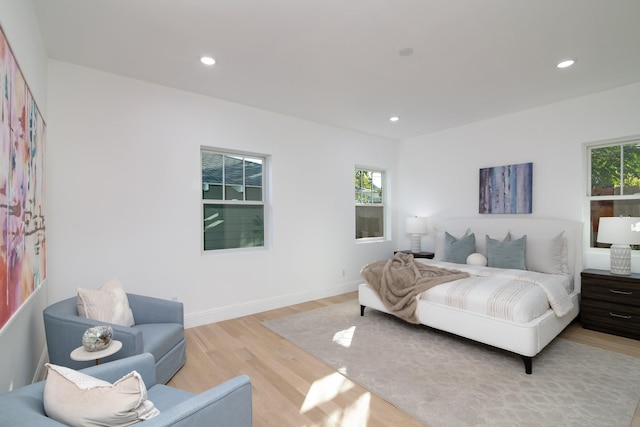 bedroom with light wood-type flooring