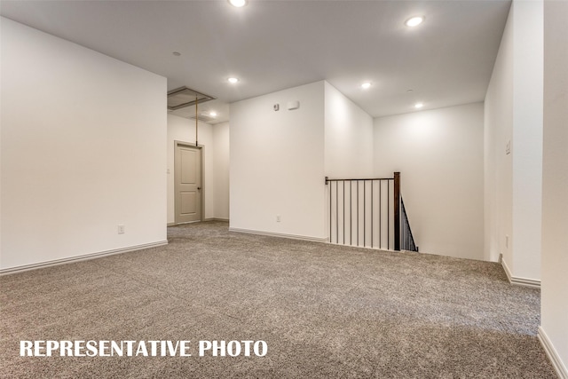 unfurnished room with carpet flooring