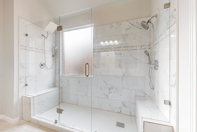 bathroom with an enclosed shower