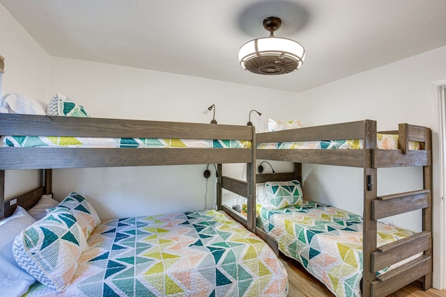 bedroom featuring hardwood / wood-style flooring