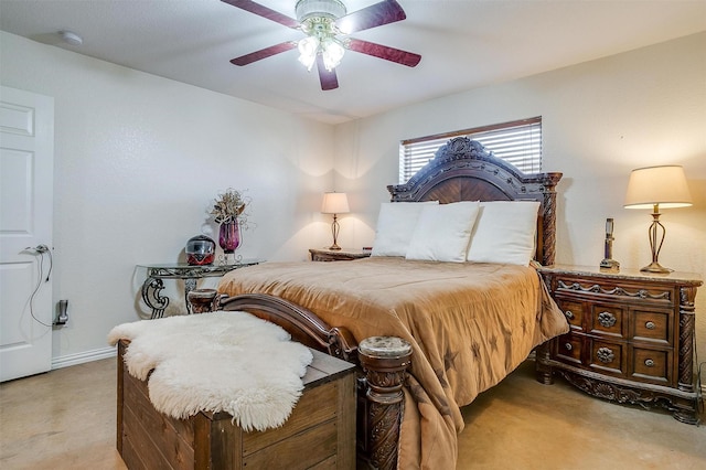 bedroom with ceiling fan and light carpet