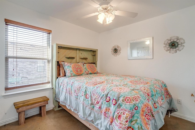 bedroom featuring dark colored carpet and ceiling fan