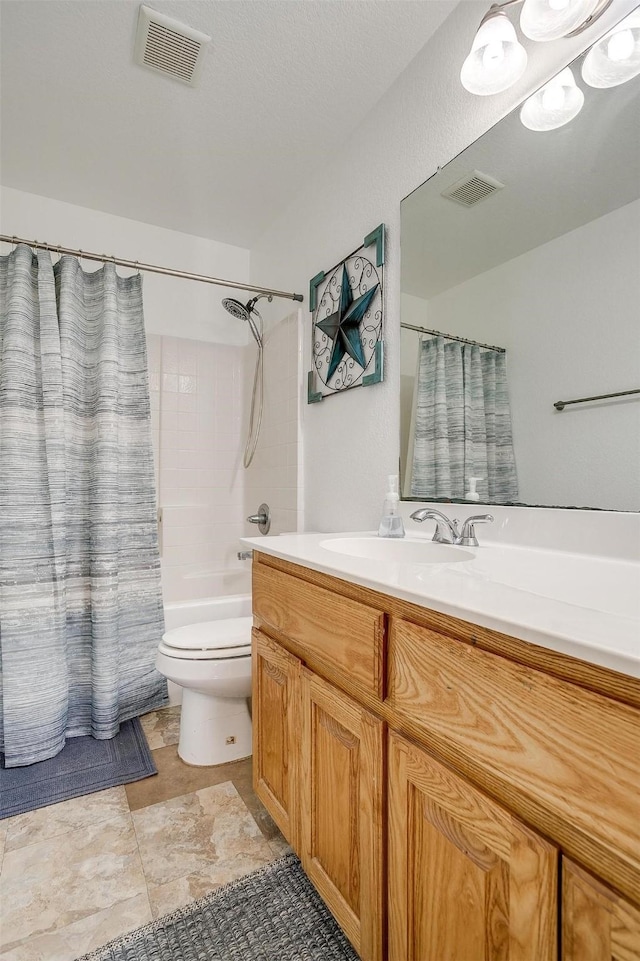 full bathroom with toilet, shower / tub combo with curtain, and vanity