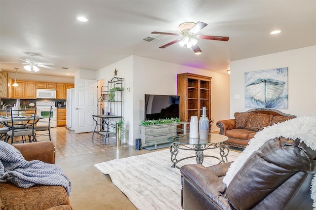 living room with ceiling fan