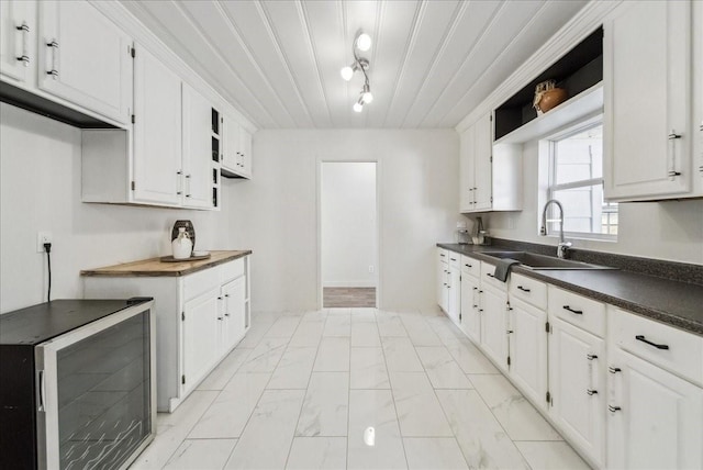 kitchen featuring white cabinets