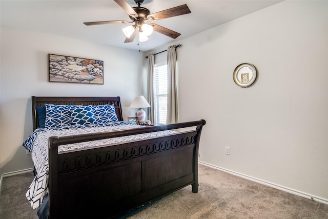 bedroom featuring ceiling fan and carpet