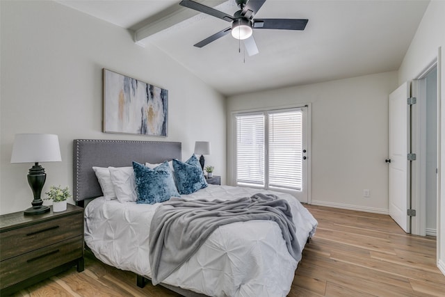 bedroom with ceiling fan, lofted ceiling with beams, and light wood-type flooring