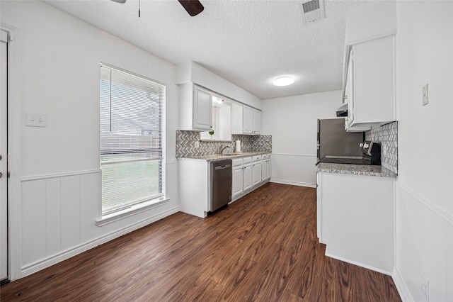 kitchen with white cabinetry, dishwasher, sink, dark hardwood / wood-style flooring, and ceiling fan