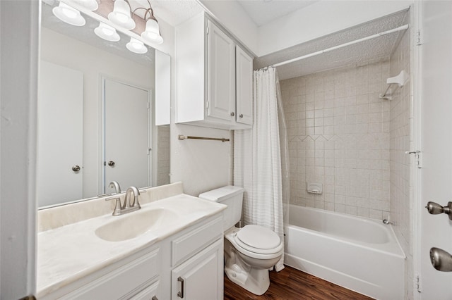 full bathroom with toilet, vanity, a notable chandelier, shower / bath combination with curtain, and hardwood / wood-style floors