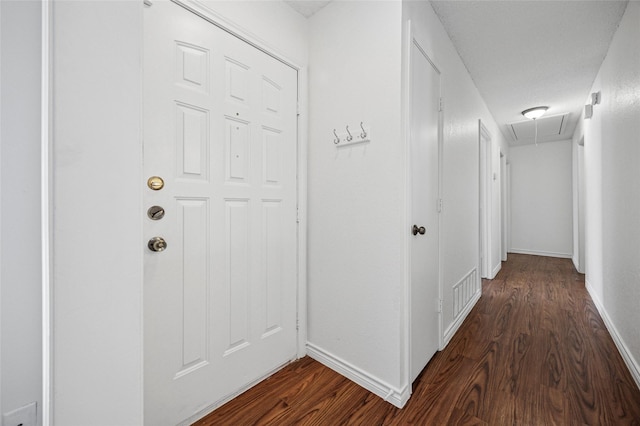 hallway featuring dark hardwood / wood-style floors