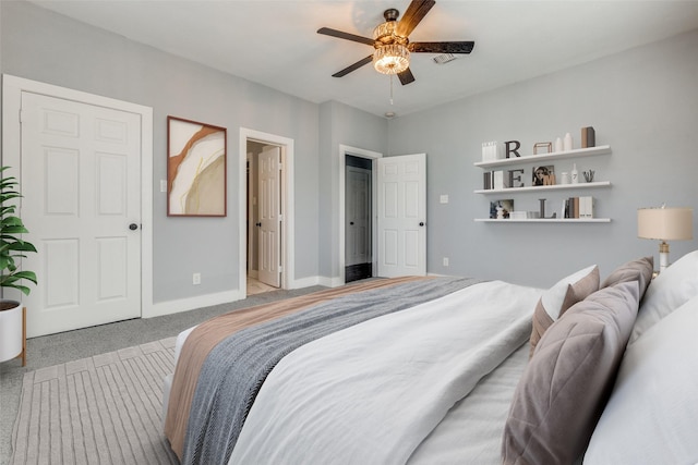 bedroom with light colored carpet and ceiling fan