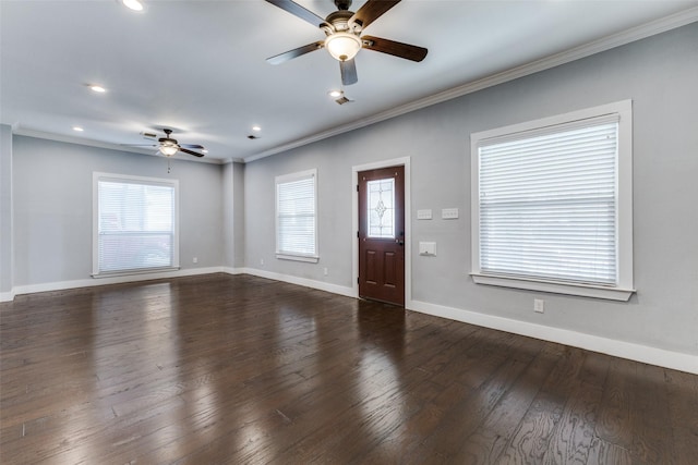 foyer with crown molding, ceiling fan, and dark hardwood / wood-style flooring