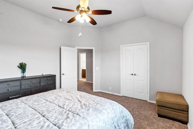 carpeted bedroom featuring lofted ceiling, ceiling fan, and a closet