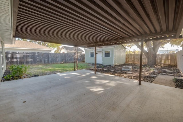 view of patio / terrace featuring a shed