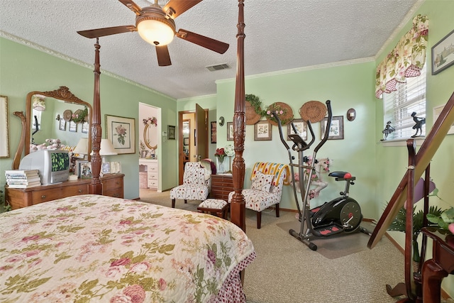 carpeted bedroom with ornamental molding, a textured ceiling, and ceiling fan