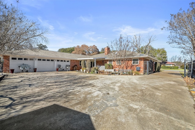 ranch-style home with a garage