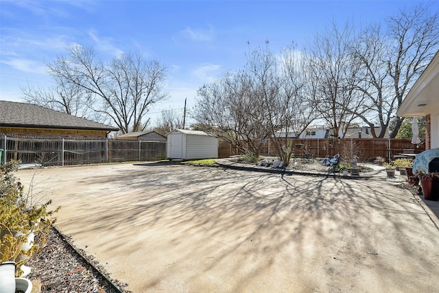 deck featuring a patio and a storage shed