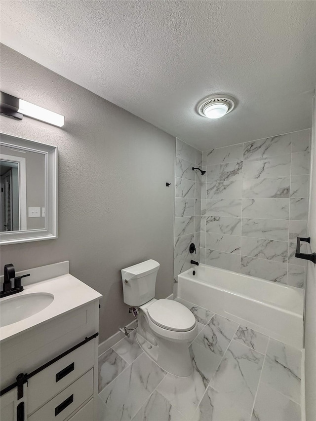 full bath with a textured ceiling, toilet, vanity, marble finish floor, and shower / washtub combination