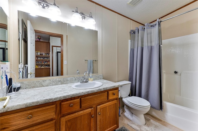 full bathroom featuring toilet, vanity, a textured ceiling, and shower / bathtub combination with curtain