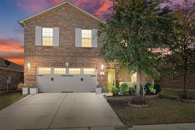 view of front of property featuring a garage