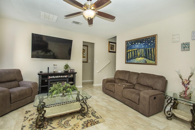 living room featuring ceiling fan